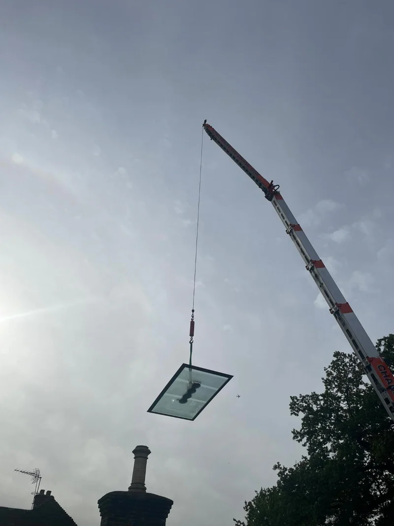 Team conducting skylight lifting in London